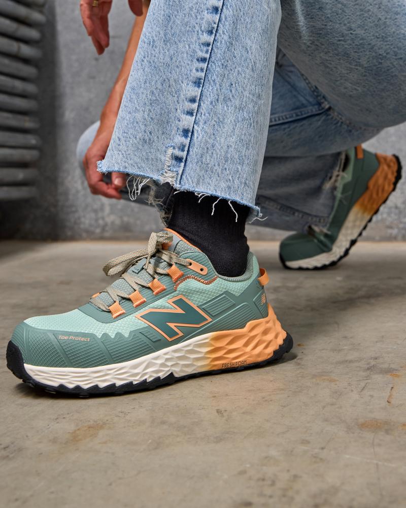 New Balance Fresh Foam Cremorne safety trainer in green and orange